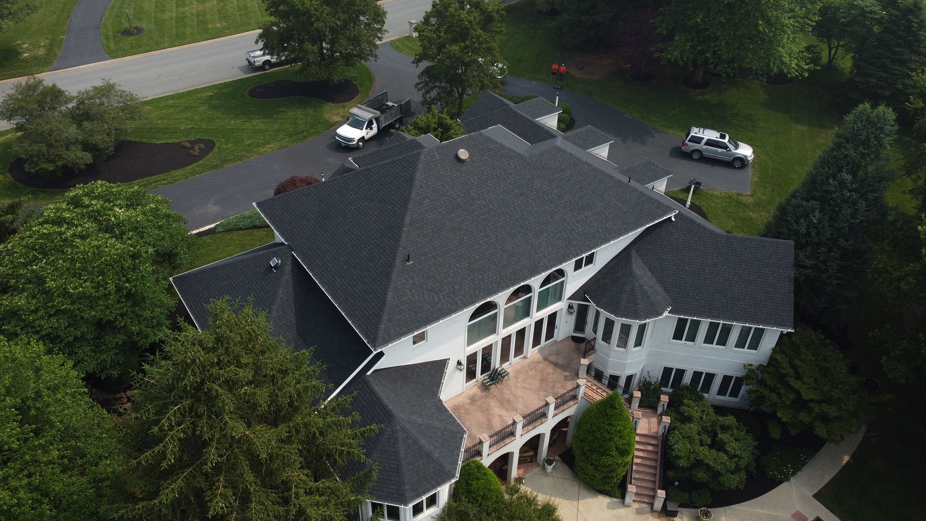 black tile roofing replacement back view