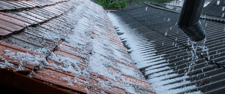 hail falls on a roof