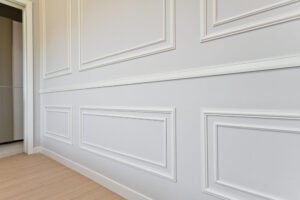 White wainscoting along a wall showing a 2025 home improvement trend