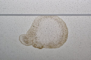 a ceilingn with a water stain