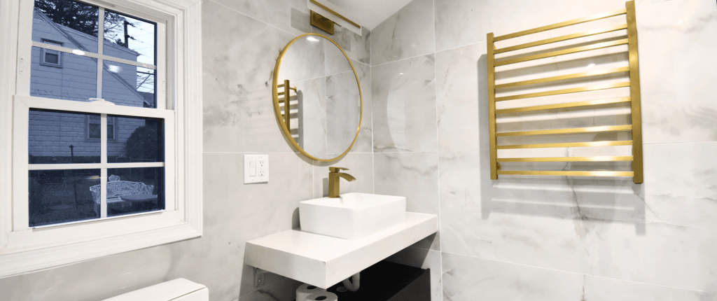 creative bathroom remodeling solution with gold accents